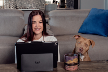 woman with computer and dog image